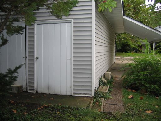 Attached shed and carport